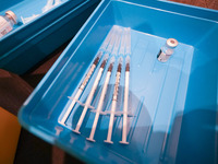  Syringes filled with COVID-19 vaccine sit on a table at a vaccination centre in Doncaster on 28 April. (