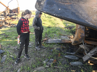 Local children  near non-exploded artillery shells in Lukashivka village, Chernihiv area, April 27, 2022. (
