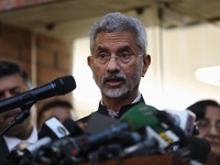 Indias Foreign Minister S. Jaishankar addresses the media as his Bangladeshi counterpart AK Abdul Momen watches after their meeting in Dhaka...