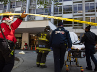 Emergency crews evaluate the scene after a vehicle crashes into the lobby of Yotel on Capitol Hil on April 28, 2022. A DC Fire official stat...