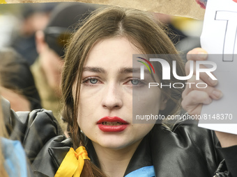 A young woman cries during a rally demanding ukrainian and international leaders to organise a humanitarian corridor for evacuation of Ukrai...