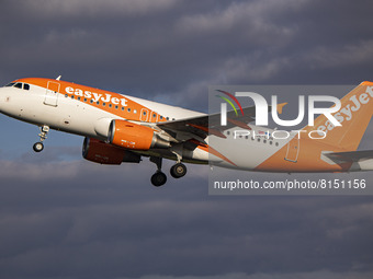 EasyJet Europe Airbus A319 aircraft as seen during taxiing, rotate and take off phase flying as departs from Amsterdam Schiphol Airport. The...