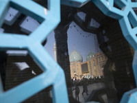 Worshipers arrive at Jamkaran's holy mosque to attend the Eid-al-Fitr mass prayers ceremony in the holy city of Qom 145 km (90 miles) south...