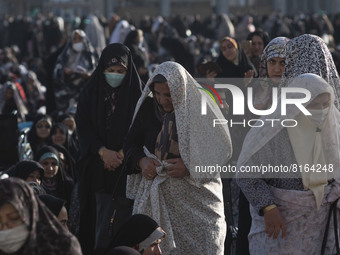 Iranian veiled women arrive at Jamkaran's holy mosque to attend the Eid-al-Fitr mass prayers ceremony in the holy city of Qom 145 km (90 mil...