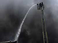 Firefighters battle blaze at meat warehouse in Getafe (Madrid) on 3rd May, 2022. (