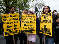 People protest in reaction to the leak of the US Supreme Court draft abortion ruling on May 3, 2022 in New York city. - The Supreme Court is...