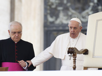 Pope Francis (R), Monsignor Leonardo Sapienza (L), attend the weekly Papal General Audience in Saint Peter's Square, Vatican City, 04 May 20...