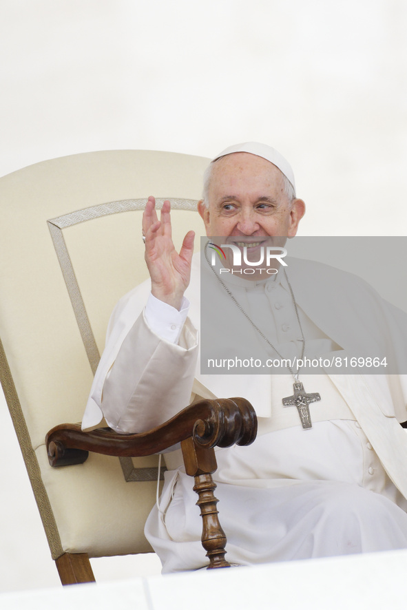 Pope Francis smiles during his weekly open-air general audience in St. Peter's Square at The Vatican, Wednesday, May 4, 2022.  