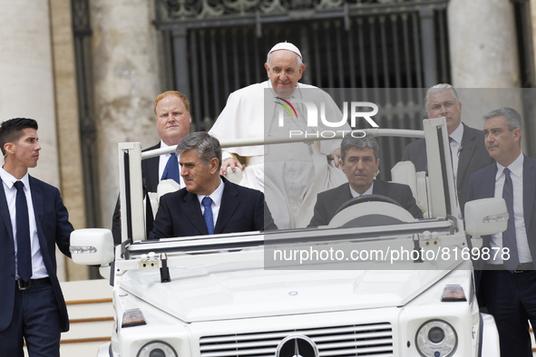 Pope Francis leaves  St. Peter's Square, at the end of his weekly open-air general audience in Vatican, Wednesday, may 4, 2022.  