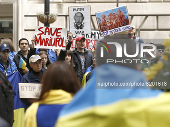 People gather in Lower Manhattan at a “Never Again” rally in support of Ukraine, on May 8, 2022 in New York City, USA. Several speakers deno...