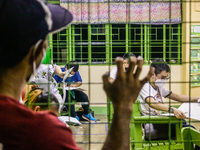 Scene inside polling precinct during the National and Local Elections in Metro Manila, Philippines on May 9, 2022. Filipinos cast their vote...