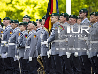 Soldiers of the guard of honour are pictured before the meeting between German Chancellor Olaf Scholz and French President Emmanuel Macron a...
