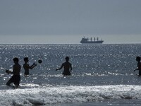 People are seen performing outdoor activities on the coastline of Carcavelos Beach. Lisbon, May 09, 2022. Two months after the lifting of th...