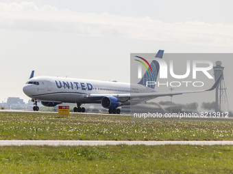 United Airlines Boeing 767-300 aircraft as seen departing from Amsterdam Schiphol Airport AMS EHAM. The wide body commercial airplane jet, i...