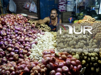 A wholesale vegetable market in Kolkata, India, 12 May, 2022. Retail Inflation Surges To 7.79% In April, Highest In 8 Years according to an...
