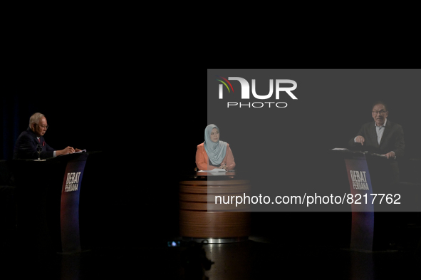 Malaysia's former prime minister Najib Razak debates with opposition leader Anwar Ibrahim in Kuala Lumpur, Malaysia, on May 12, 2022. 