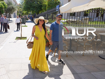 Tourists walk through the streets of Athens on 12 May 2022. (