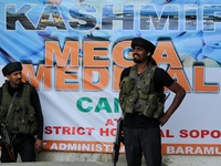 Indian army soldier smiles as they stand alert during LG Manoj Sinha's visit to Sopore, District Baramulla Jammu and Kashmir India on 13 May...