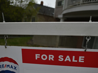 FOR SALE sign seen outside a house in the center of Edmonton. On Friday, May 12, 2022, in Edmonton, Alberta, Canada. (