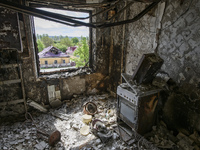 View from the kitchen in the burned apartment in the residential building, destroyed during russia's invasion in Ukraine, in the Borodianka...