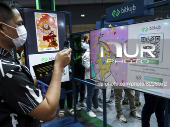 Visitors experience digital coin exchanges at the Thailand Crypto Expo in Bangkok, Thailand, 14 May 2022. (
