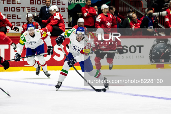 Team Italy #88 skating with the puck 
©IIHF2022  during the Ice Hockey World Championship - Switzland vs Italy on May 14, 2022 at the Ice H...