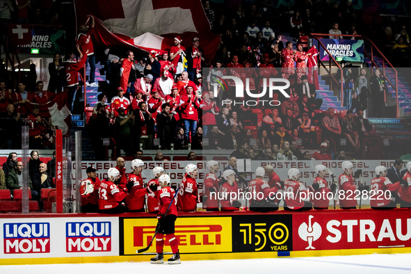 Team swiss bench after goal  with spectators in the back 
Team Swiss 
Team Italy 
©IIHF2022  during the Ice Hockey World Championship - S...