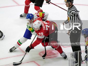 Face off 
Team Swiss 
Team Italy 
©IIHF2022  during the Ice Hockey World Championship - Switzland vs Italy on May 14, 2022 at the Ice Hal...