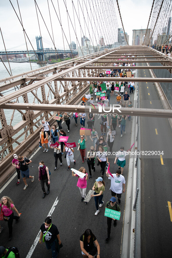 Abortion rights activists march from Cadman’s Plaza across the Brooklyn Bridge to Foley Square on May 14, 2022. 