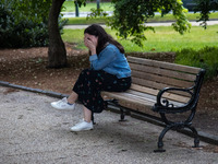A woman cries alone on a bench outside of the U.S. Capitol during the Bans Off Our Bodies Women's March in Washington, D.C. on May 14, 2022...