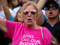 People march to the Supreme Court during the Bans Off Our Bodies Women's March in Washington, D.C. on May 14, 2022 (