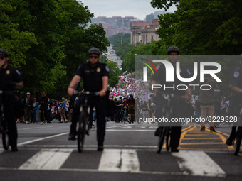 People march to the Supreme Court during the Bans Off Our Bodies Women's March in Washington, D.C. on May 14, 2022 (