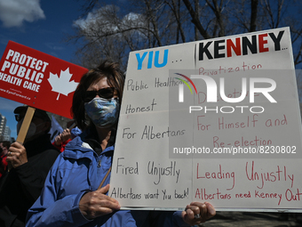 Health-care workers, activists and their supporters protest against Premier Kenney and the UCP government that are taking steps to privatize...