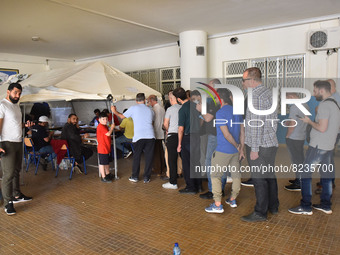 Citizens arrive to cast their votes at a polling station during general elections in Beirut, Lebanon on May 15, 2022. (