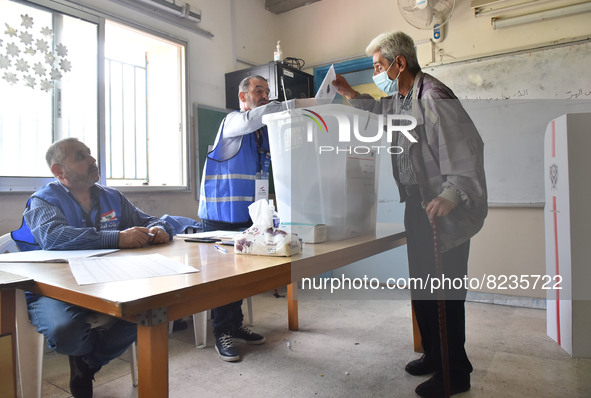 Citizens arrive to cast their votes at a polling station during general elections in Beirut, Lebanon on May 15, 2022. 