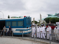 Police officers stands at barricades around Okinawa Convention Center as Okinawa Reversion 50th Anniversary Ceremony is held in Ginowan, cel...