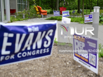 A day ahead of the Primary Elections campaign sings posted outside a polling station inform voters in the Mount Airy neighborhood in the Nor...
