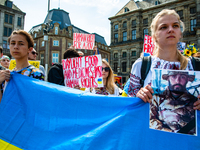 The Ukrainian community in The Netherlands gathered at the Dam square in Amsterdam to demand the extraction of the Ukrainian soldiers trappe...