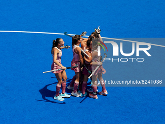 Agustina Albertarrio (R) of Argentina celebrates after scoring her side's first goal with her teammates during the FIH Hockey Pro League Wom...