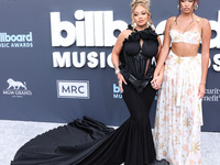 Latto (Alyssa Michelle Stephens) and Brooklyn Nikole arrive at the 2022 Billboard Music Awards held at the MGM Grand Garden Arena on May 15,...