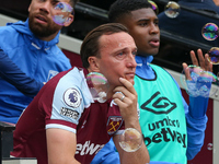 West Ham United midfielder Mark Noble (16) upset bubbles during the English championship Premier League football match between West Ham Unit...