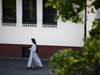 Members of a local parish in Warsaw, Poland take part in a procession to commemorate the death of the patron saind of Poland Andrzej Bobola...