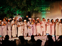 Baul musicians perform at an event organized by Bangladesh shilpokola Academy on the first night of The full moon in Dhaka, Bangladesh on Ma...