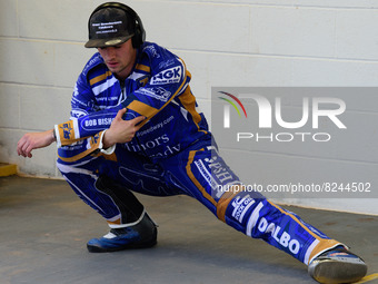 Jack Thomas  does some stretching exercises  during the SGB Premiership match between Belle Vue Aces and King's Lynn Stars at the National S...