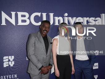 NEW YORK, NEW YORK - MAY 16:  (L-R) Ernie Hudson, Caitlin Bassett and Raymond Lee attend the 2022 NBCUniversal Upfront at Mandarin Oriental...