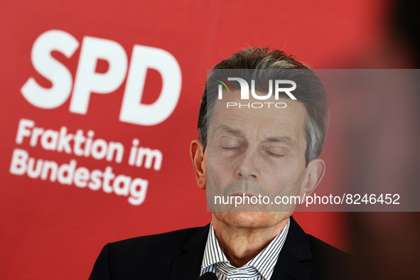 Chairman of the Social Democratic Party (SPD) Parliamentary Group Rolf Muetzenich gives a statement to the media prior to the meeting in Bun...