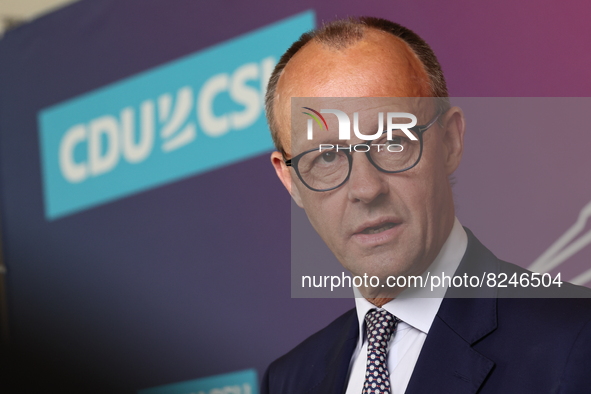 Chairman of the Christian Democratic Union and Leader of the CDU/CSU Parliamentary group Friedrich Merz gives a statement to the media prior...