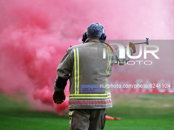 Fireman going clear Flares after  FA Cup Final between Chelsea and Liverpool at Wembley Stadium , London, UK 14th May , 2022
 (
