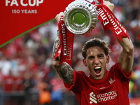 Liverpool's Diogo Jota left the Trophy  FA Cup Final between Chelsea and Liverpool at Wembley Stadium , London, UK 14th May , 2022
 (