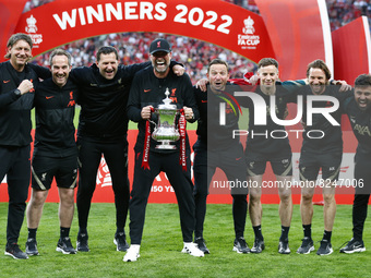 Liverpool manager Jurgen Klopp (MIDDLE) holds the FA Cup with his back Staff after their sides 6-5 penalty shoot-out after a 0-0 draw in nor...